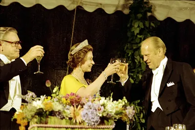 President Gerald R. Ford, Vice President Nelson A. Rockefeller, and Queen Elizabeth II of Great Britain Raising Their Glasses in a Toast at a State Dinner Honoring Her Majesty and Prince Philip