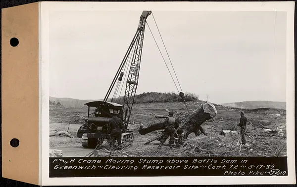 Contract No. 72, Clearing a Portion of the Site of Quabbin Reservoir on the Upper Middle and East Branches of the Swift River, Quabbin Reservoir, New Salem, Petersham and Hardwick, P and H crane moving stump above Baffle Dam in Greenwich, Greenwich, Mass., May 17, 1939