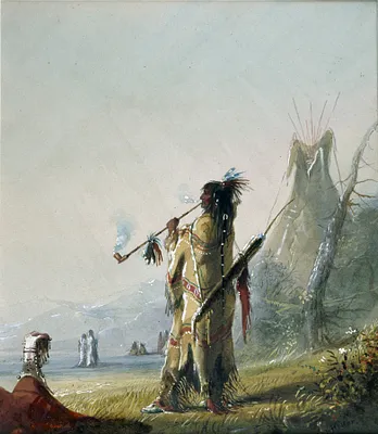 A Shoshonee [sic] Indian Smoking