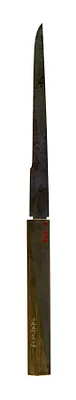 Kozuka with Figure in a Bamboo Grove