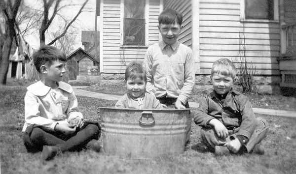 Children Playing in Yard, Webster City, 1917