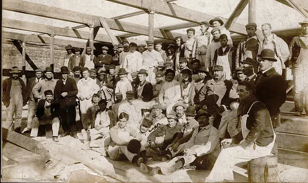 Workers engaged in building the Ayer Mill chimney