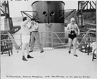 Photograph of President Truman with his Military Aide, General Harry Vaughan (left), and Secret Service Agent Jim Rowley, on the flying bridge of the President's yacht, the U.S.S. WILLIAMSBURG, during his vacation cruise to Bermuda