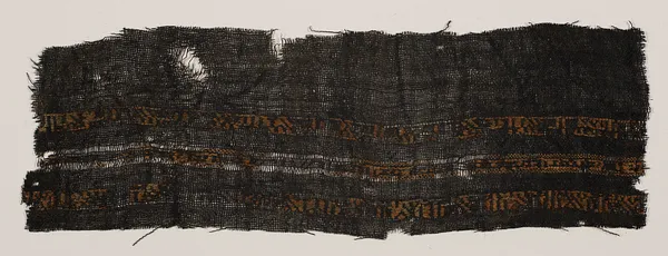 Tiraz fragment with embroidered inscription
