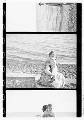 Maude Sanromá holding a child