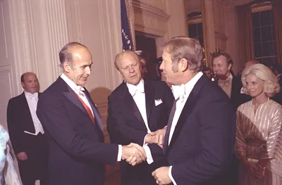 President Gerald R. Ford and President Valery Giscard d'Estaing of France Greeting Baseball Player Mickey Mantle in the Receiving Line at a State Dinner Honoring President Giscard d'Estaing