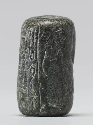 Cylinder Seal with a Figure, Animals, and an Inscription