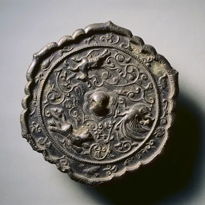 Hexafoil Mirror with Floral Interlaces, a Phoenix, and Running Animals